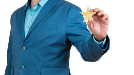 human hand holding golden starの写真素材