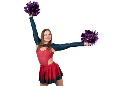 happy cheerleader girl in uniform dancing with pompoms isolated on white