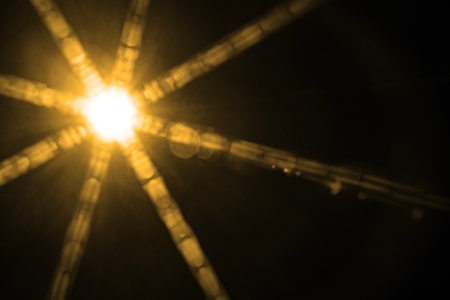 Abstract Natural Sun flare on the blackの写真素材