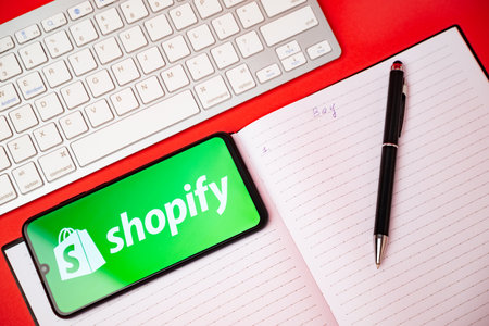 Kyoto city, Japan - May 05, 2023: The logo of Shopify visible on a smartphone screen