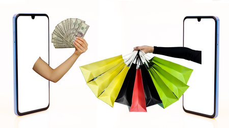 Two Hands outstretched from from different smartphone screen one with dollar bills, the other with...