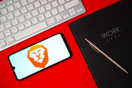 Kyoto city, Japan - May 05, 2023: The logo of Brave, an open-source privacy-focused web browser with over 60 million users, is seen on a smartphone screenのeditorial素材