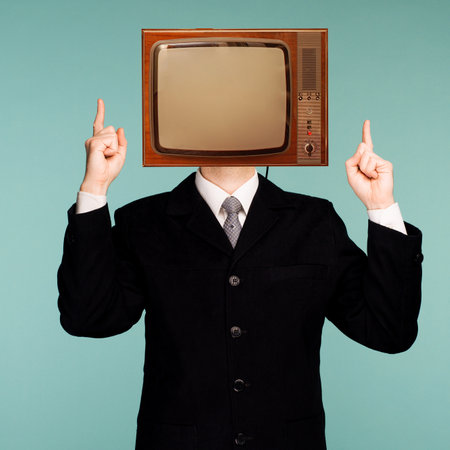 Modern minimal retro collage art. Retro Tv Businessman pointing fingers up. News, propaganda concept.の写真素材
