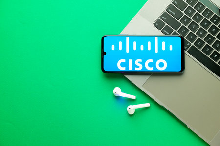 Kyoto city, Japan - July 31, 2023: Cisco logo on the smartphone screen is placed on the Apple...