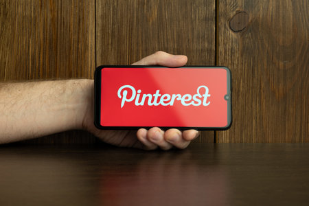 Kyoto city, Japan - July 31, 2023: Apple iPhone with Pinterest application on the screen. Pinterest is an online pinboard that allows people to pin their interesting things.のeditorial素材