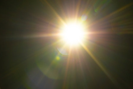 Blurred image Sun flare on the black background