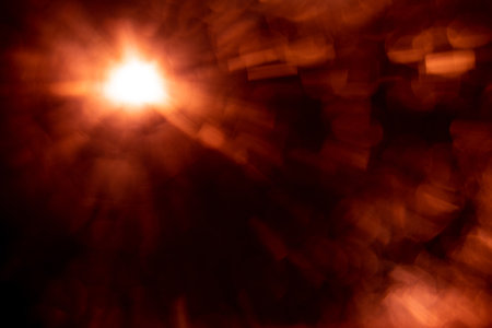 Abstract Natural Sun flare on the blackの写真素材