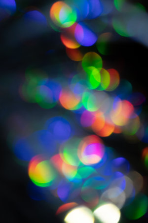 Multicolored rainbow large bokeh effect backgroundの写真素材