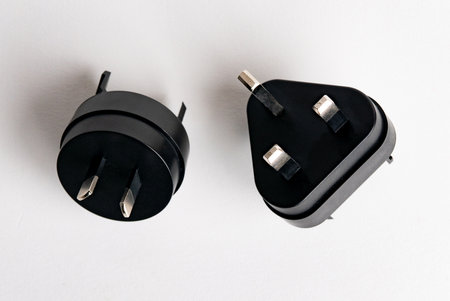 Adapter for English type G and I socket isolated on white background