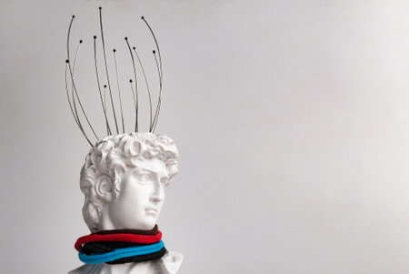 Antique male David statue's head with manual Massager for head isolated on a white background. 3d trendy creative collage in magazine style. 3d contemporary art. Modern designの写真素材