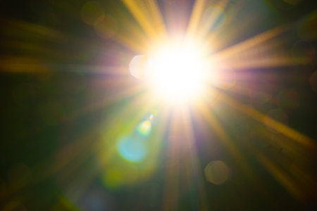 Sun flare on the black backgroundの写真素材