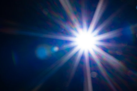 Sun flare on the black background