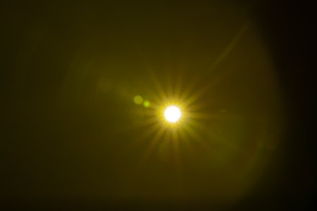 Sun flare on the black background