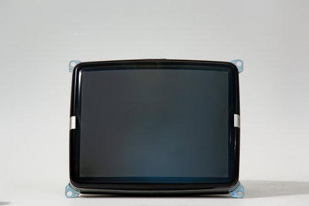 The kinescope of an old TV or monitor lies on a white backgroundの写真素材