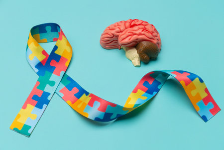 Human brain with Puzzle pattern ribbon. World Autism awareness and pride day.の写真素材