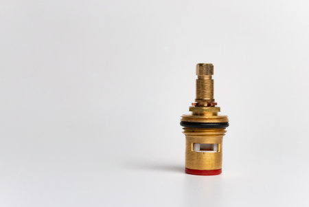 Water faucet-axle box with ceramic plates on a c background close-up macro photography