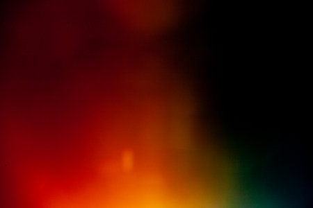 Sun flare on the black backgroundの写真素材