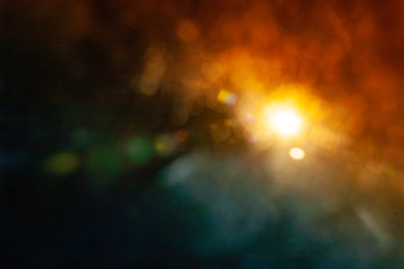 Sun flare on the black backgroundの写真素材