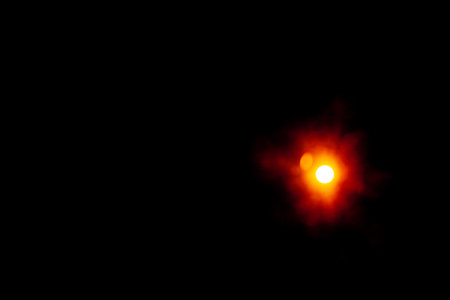 Sun flare on the black background