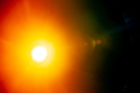 Sun flare on the black background