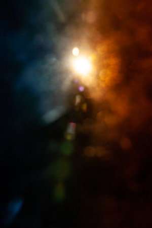 Sun flare on the black backgroundの写真素材