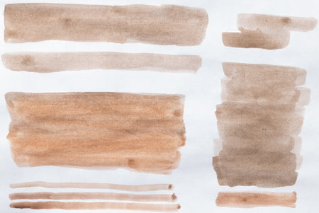 Set of watercolor brushstroke in the color Mocha Mousse. Hand drawn textured template with elegant warm brown tone. Perfect for creating trendy graphic resourceの写真素材
