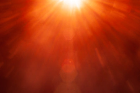Sun flare on the black backgroundの写真素材