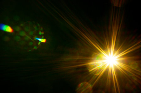 Sun flare on the black backgroundの写真素材