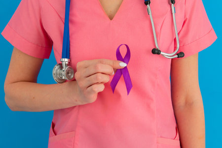 Female doctor in white uniform with purple awareness of ribbon in hand for ADD,ADHD,Alzheimer Disease ,Arnold Chiari Malformation,Childhood Hemiplegia stroke, Epilepsy, Chronic Acute Pain,Crohnsの写真素材