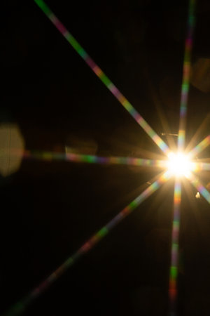 Abstract sun flare. The lens flare is subject to digital correction.