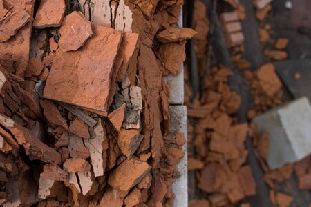 Close up of broken red bricks background