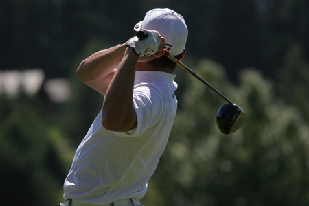 man golf swing on the courseの写真素材