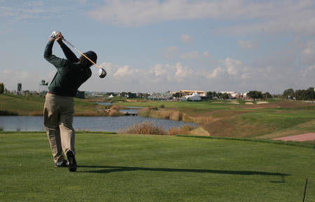 man golf swing on the courseの写真素材