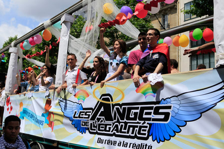 Paris, France June 29 th, 2013: Protesters marching for gay rights at The Gay Pride parade in Paris, France.のeditorial素材