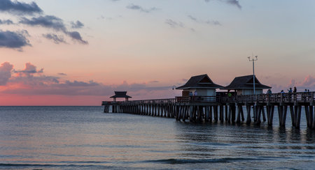 NAPLES, UNITED STATES, NOVEMBER 30, 2017 : pier jetty at sunset , november 30, 2017, in Naples, Florida, united statesのeditorial素材