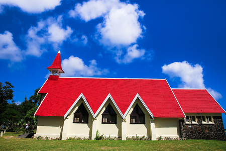 Church with red roof in Cap Malheureux, Mauritius islandの写真素材