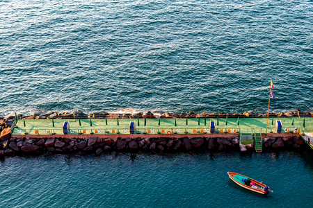 Beach huts and jetty in the port of Sorrento, near Naples, Campania, Italyの写真素材