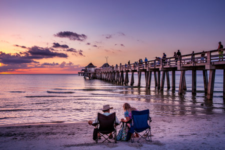 NAPLES, UNITED STATES, NOVEMBER 30, 2017 : pier jetty at sunset , november 30, 2017, in Naples, Florida, united states