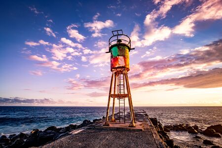 jetty and lighthouse in Saint Pierre, La Reunion island, Indian Ocean, april 26, 2016,  Saint Pierre, Franceの写真素材