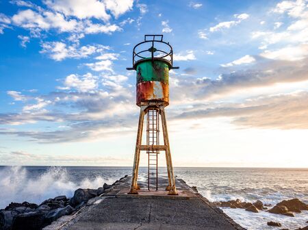 jetty and lighthouse in Saint Pierre, La Reunion island, Indian Ocean, april 26, 2016,  Saint Pierre, Franceの写真素材