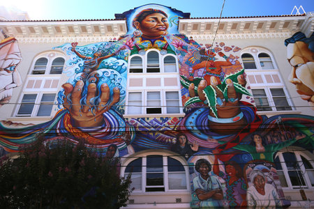 SAN FRANCISCO, CALIFORNIASEPTEMBER 17, 2014 : Mexican murals painted walls of Casa de las mujeres, near Balmy Alley, september 17, 2014,  in  San Francisco, California, USAのeditorial素材