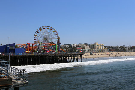 SANTA MONICA, CA, UNITED STATES, APRIL 12, 2015 : Santa Monica pier on the beach of santa monica, california, united statesのeditorial素材