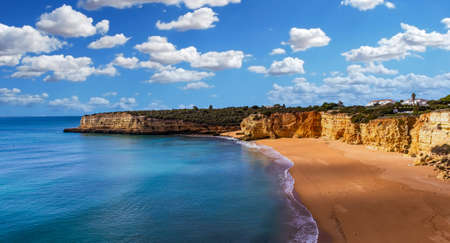 Beach and cliffs of Senhora da rocha, in Lagoa, Algarve, Portugalの写真素材