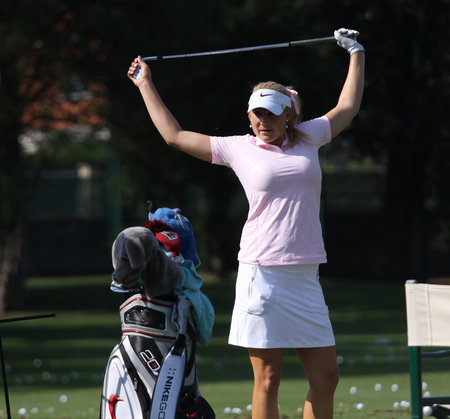 lady golfer in action on a golf course, in Evian, franceのeditorial素材