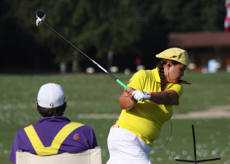 lady golfer in action on a golf course, in Evian, franceのeditorial素材