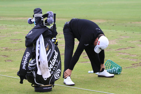 PARIS, FRANCE, JULY 15, 2012: golfer in action at the French open 2012のeditorial素材