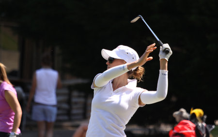 lady golfer on a golf course, in Fourqueux, france, june 06, 2013のeditorial素材