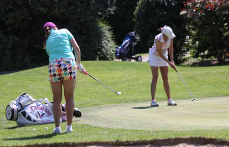 lady golfer on a golf course, in Fourqueux, france, june 07, 2013のeditorial素材