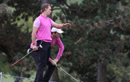 SAINT NOM LA BRETECHE, FRANCE, OCTOBER 5, 2013: golfers Gregory Bourdy and Joost Luiten in action at the Sevriano Ballesteros trophy 2013のeditorial素材