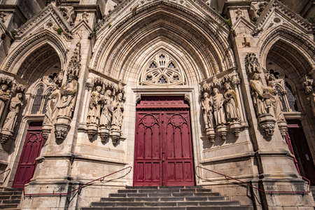 CHATEAUNEUF SUR CHER, FRANCE, APRIL 09, 2022: exteriors and architectural details of Our Lady of the Children basilicaのeditorial素材